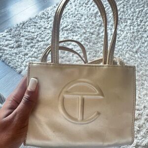 Gold authentic mini telfar bag